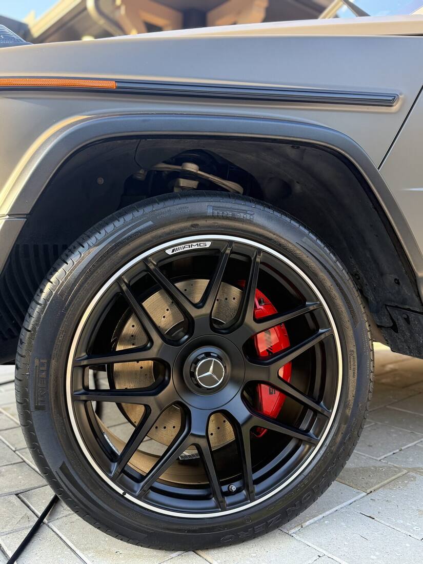 AMG wheel with red calipers deep cleaned